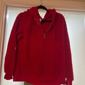 Red fuzzy winter hoodie with zipper